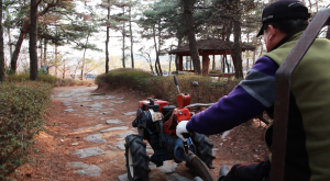 Choi riding his Korean-styled tractor.